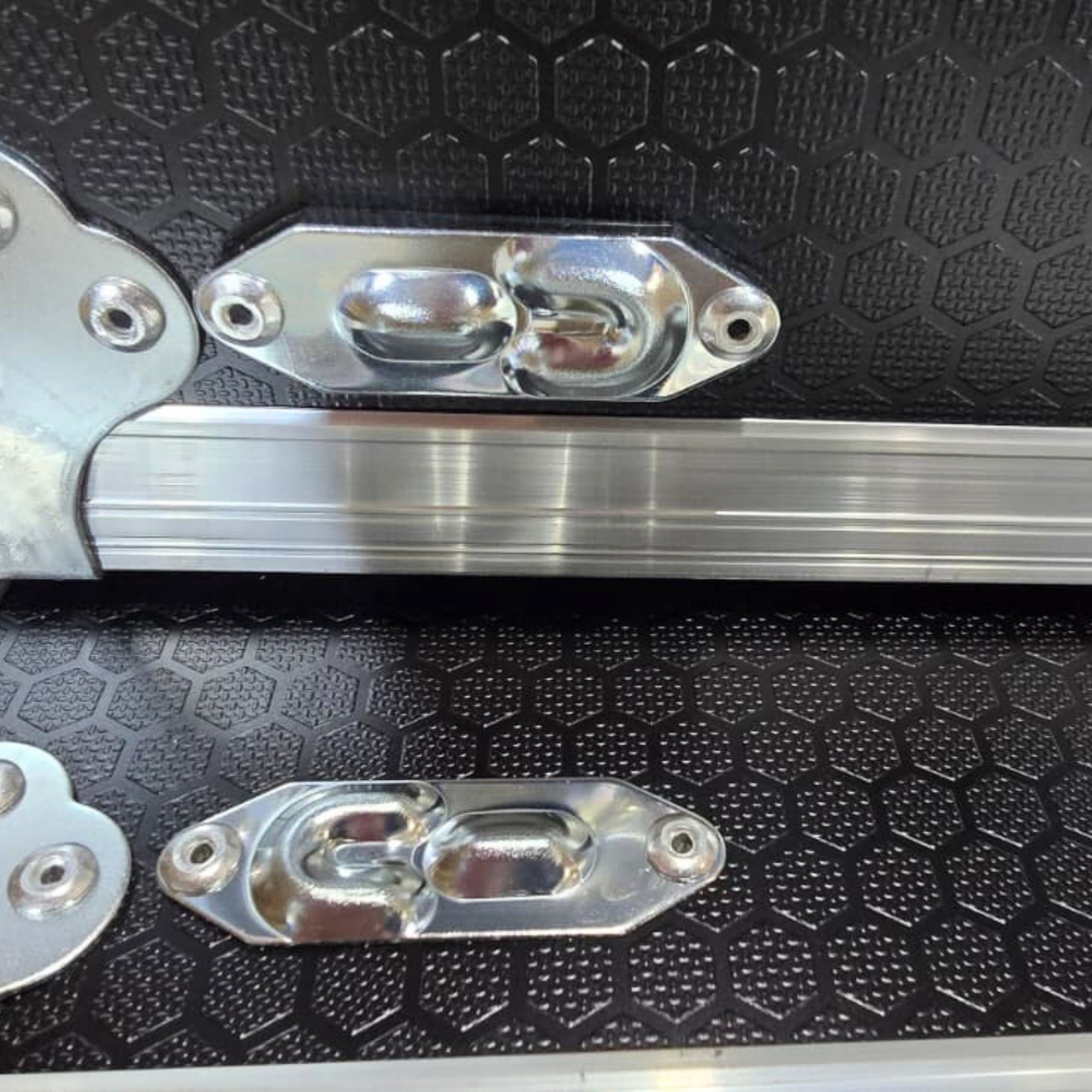 Close-up of Ovation Slide Away Rack Mount Case showing sophisticated interlocking stacking hardware