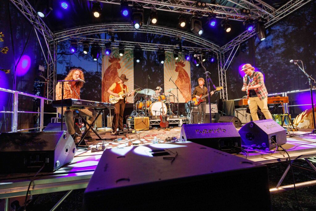 R-Series Productions setup featuring DQ's Global Truss Arc Roof Structure at Dashville Skyline Festival.